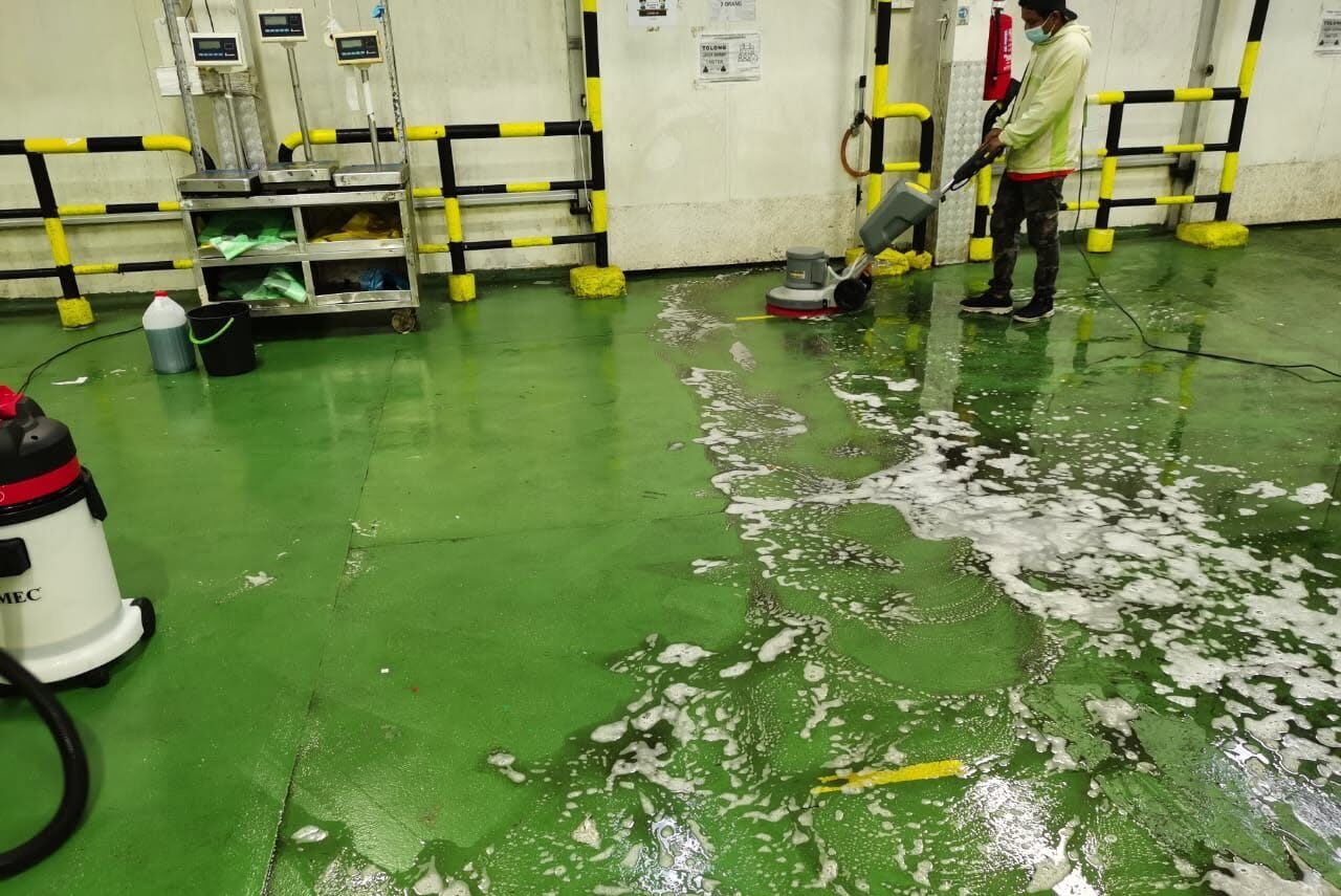 Floor scrubbing by Big Family Cleaning